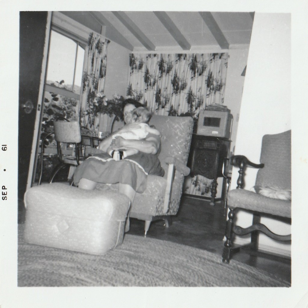 grandmother holding baby, 1961, 